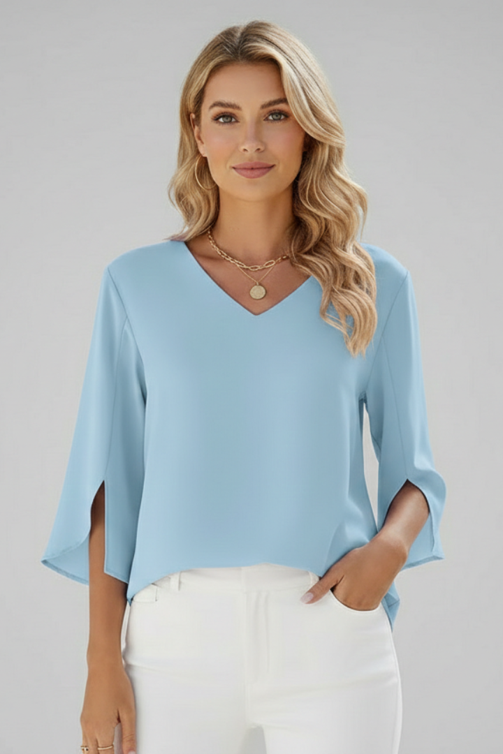 Loose blue tunic blouse with split sleeves